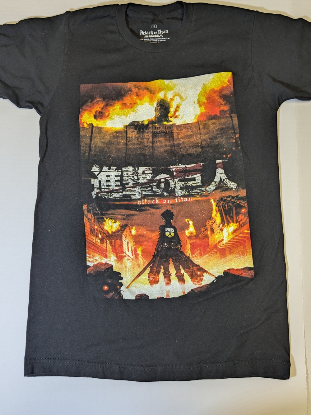 Ripple Junction Black Anime Graphic Tee with Fiery Orange and Yellow Print